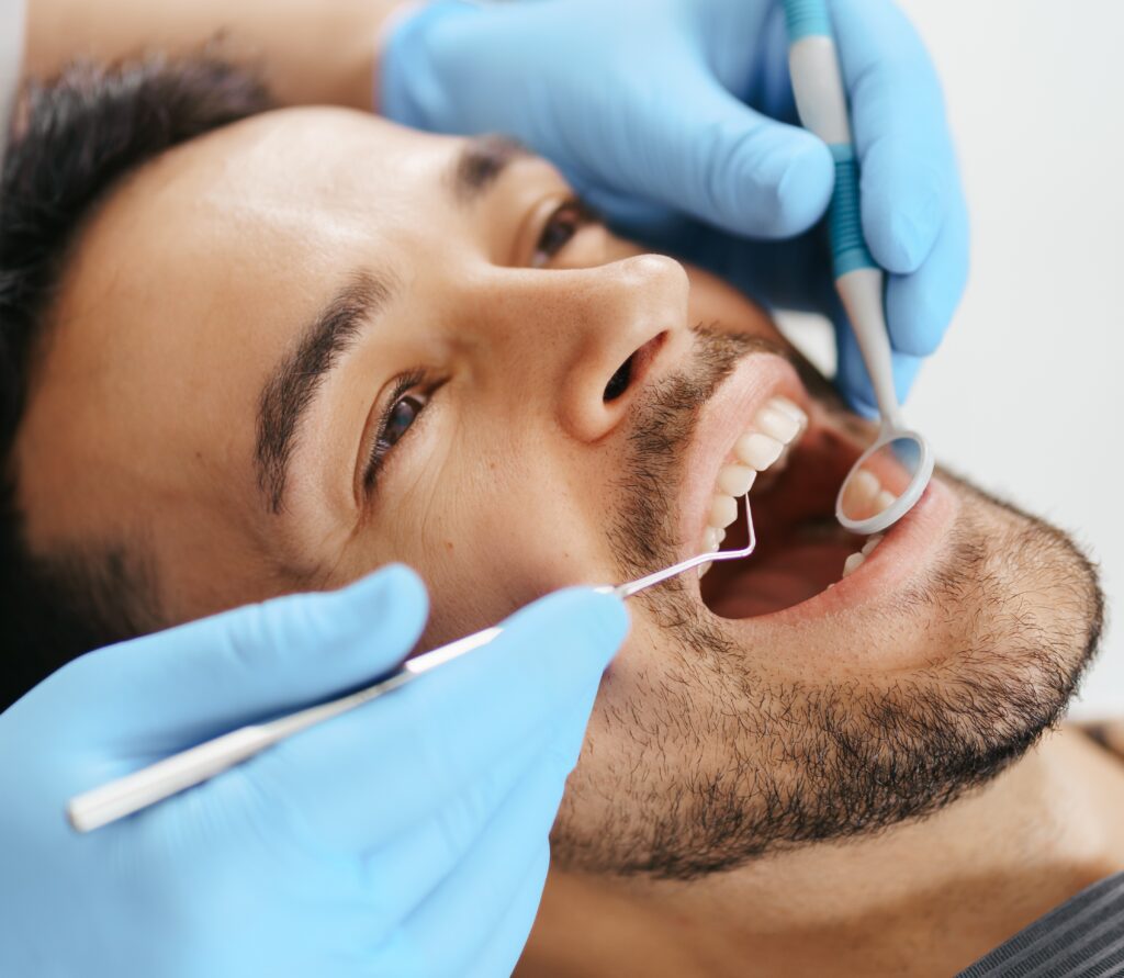 Cavity filling cost with no insurance and how to save money. What does a white tooth filling cost?